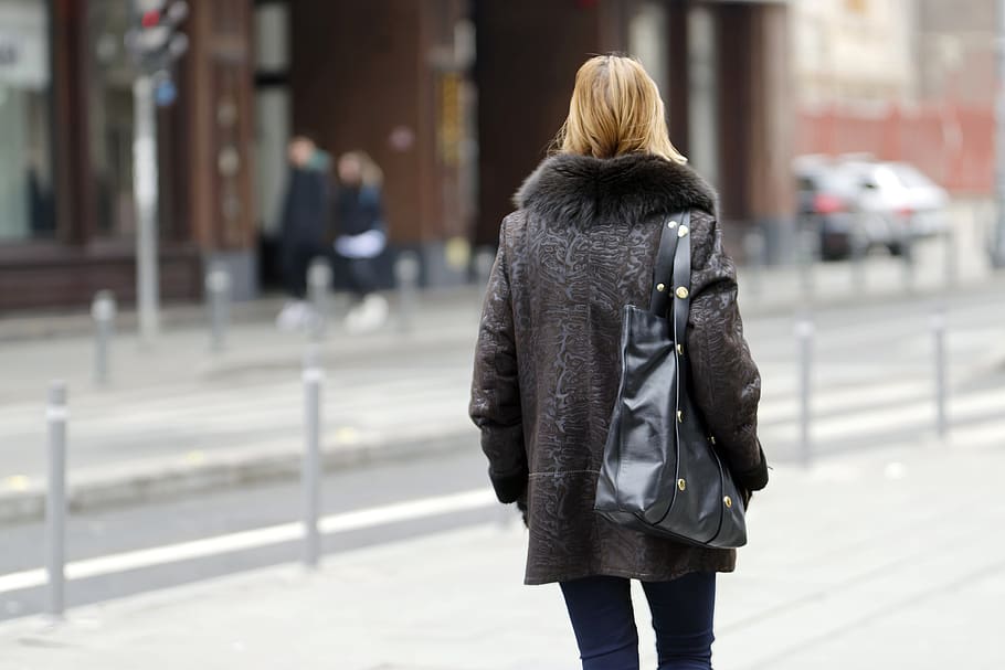 girl, woman, young, hair, blond, bag, the shoulder, going, the sidewalk, street, buildings