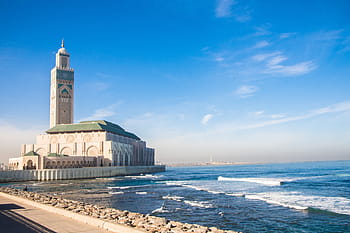 beige, green, brick building, body, water, daytime, casablanca, mosque, sea, morocco, travel