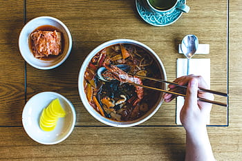 korean seafood stew, Eating, Korean, seafood, stew, hands, soup, top view, wood, food, chopsticks