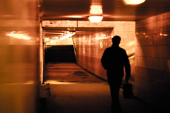 people, man, alone, walking, building, light, alley, underground, silhouette