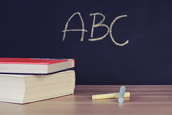 books, chalks, wooden, surface, two, yellow, near, hardbound, school, desk, chalkboard