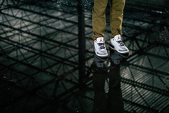 person, wearing, air jordan basketball shoes, pair, white, black, air, jordan, shoes, footwear, floor