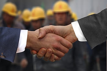 person shaking hands, shaking hands, handshake, hands, workers, employee, helmet, welcome, agreement, contract, hand giving
